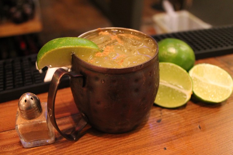 Daily-Grog-Goslings-rum-lime-brown-sugar-orange-cinnamon-on-the-rocks-in-a-copper-cup.jpg